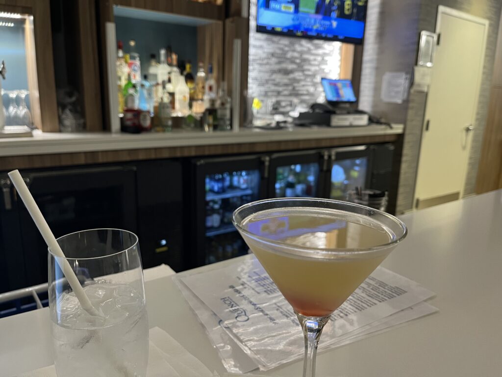 a martini glass on a bar counter