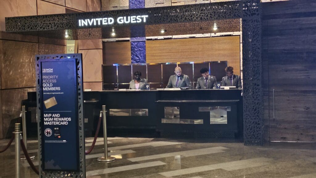 a group of people at a reception desk