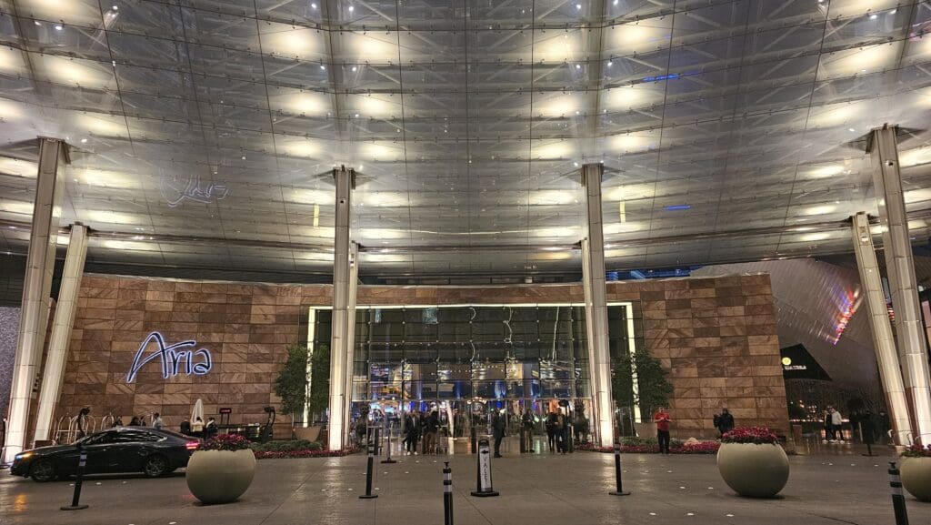 a glass ceiling with people walking in it