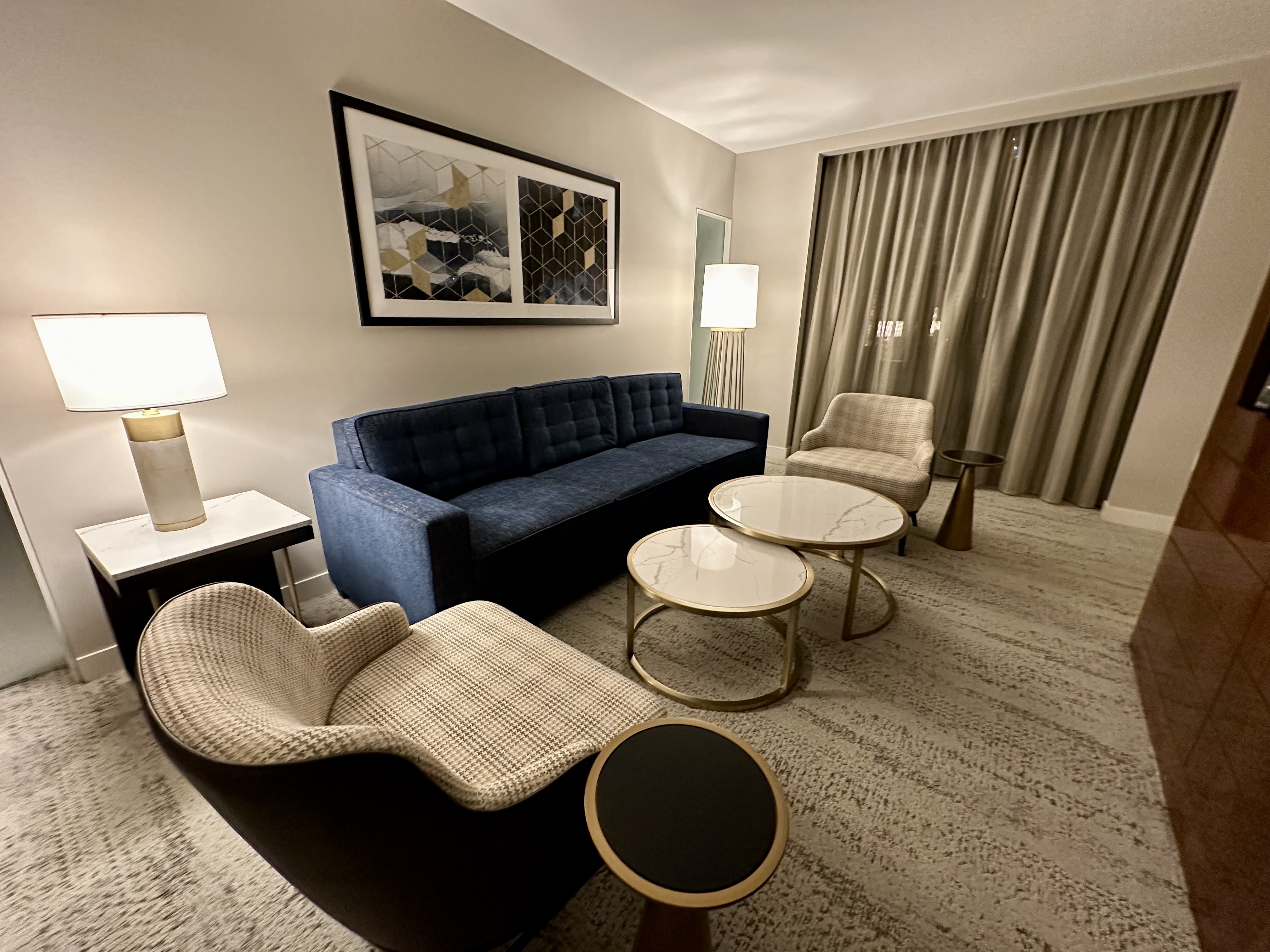 a room with a couch and chairs at the JW Marriott Marquis Miami