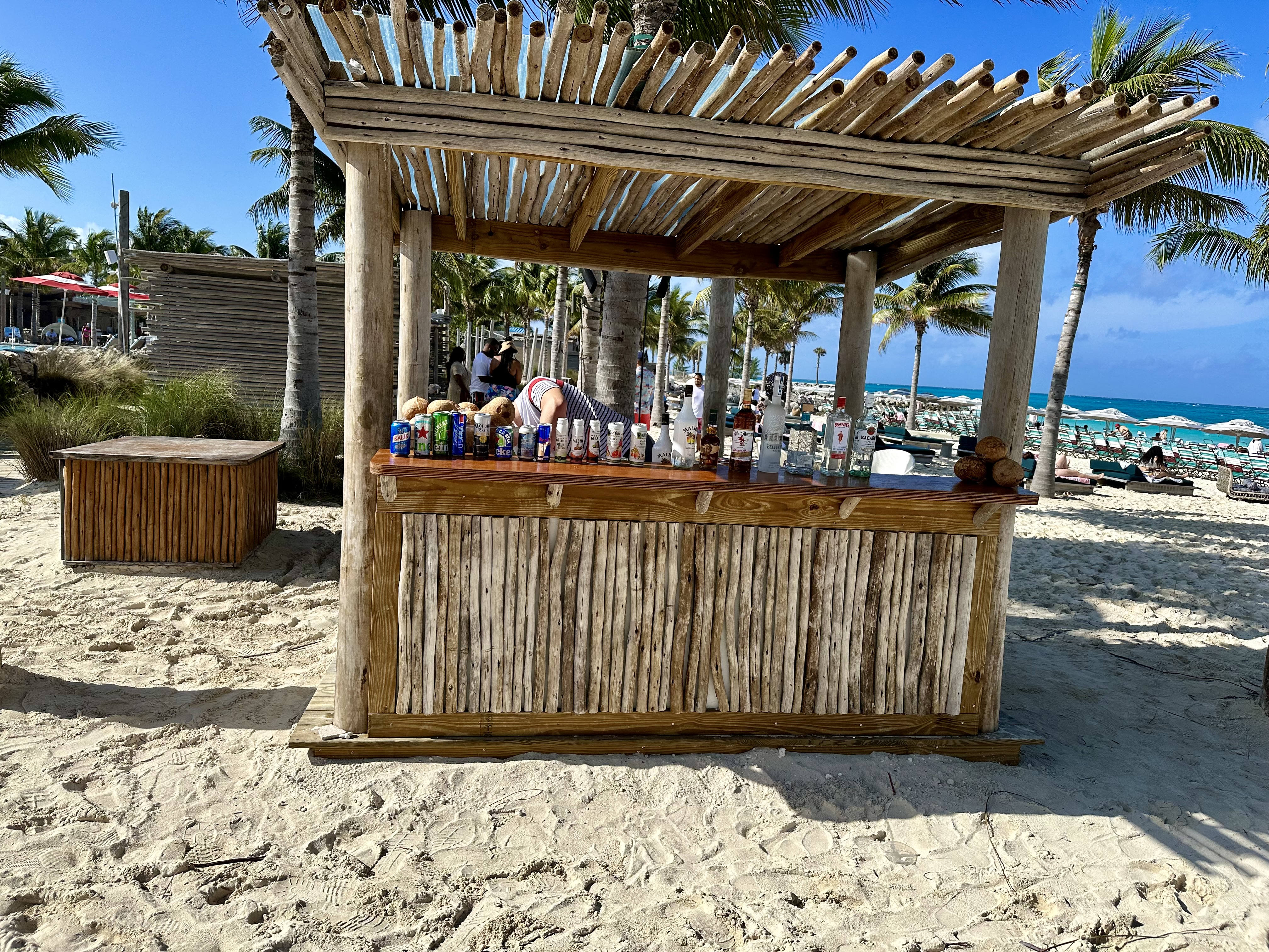 a wooden bar on a beach