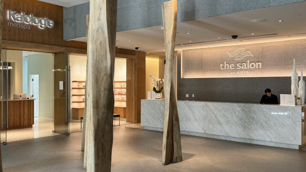 a large wooden pillars in a lobby