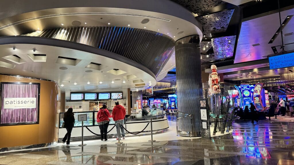 people in a building with a large circular ceiling