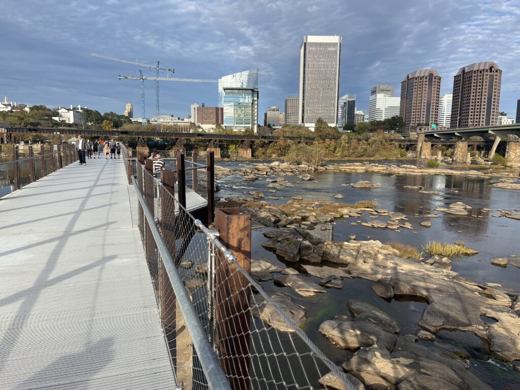a bridge over a river with a city in the background in Richmond, Virginia