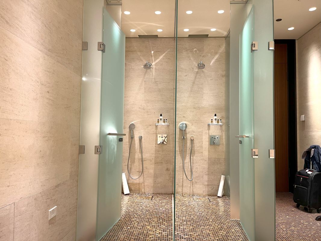 a shower with glass doors