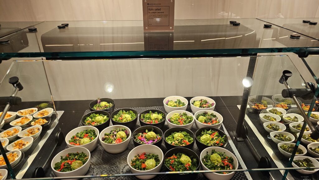 a group of bowls of salad