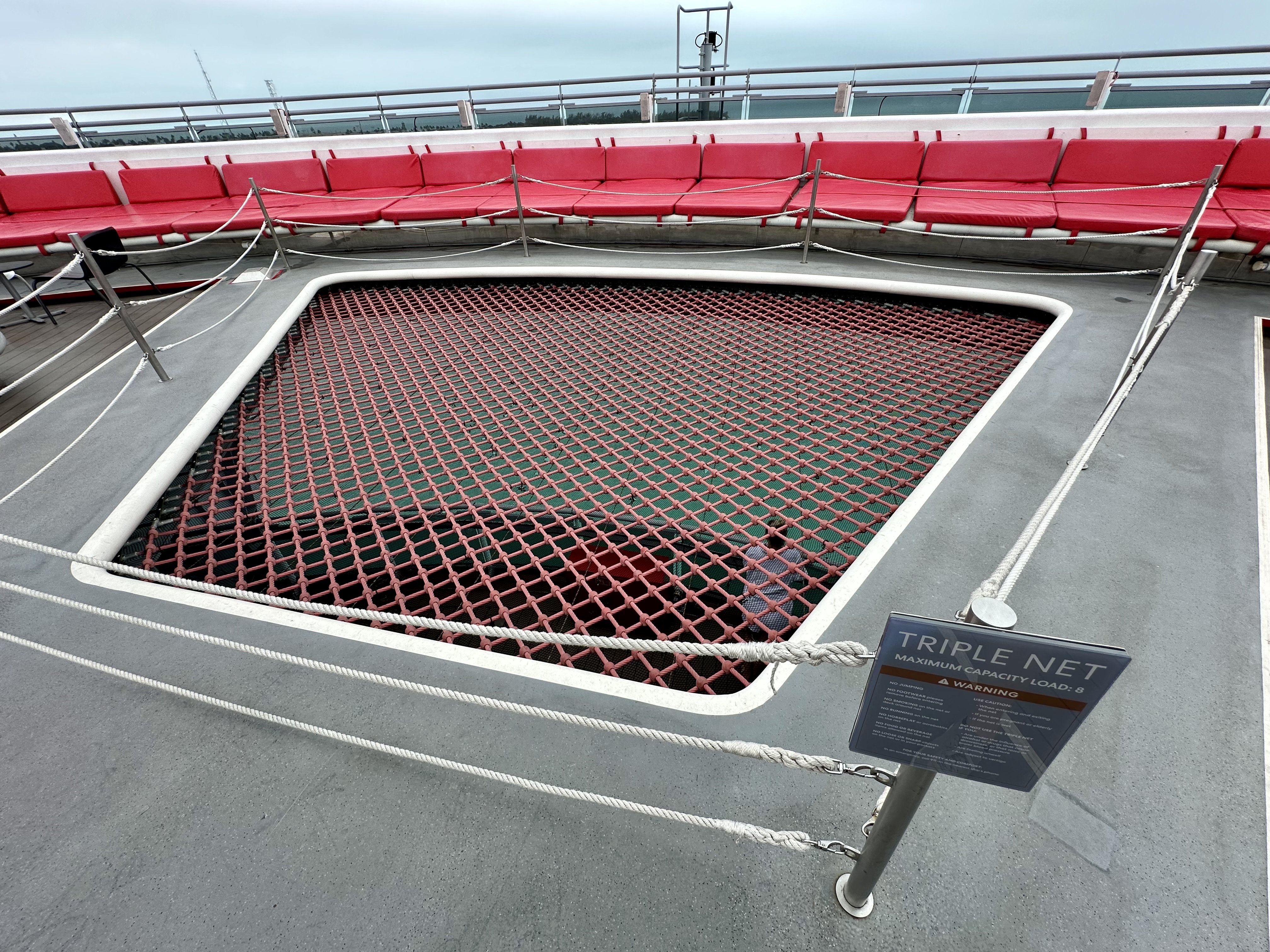 a red and white net on a boat