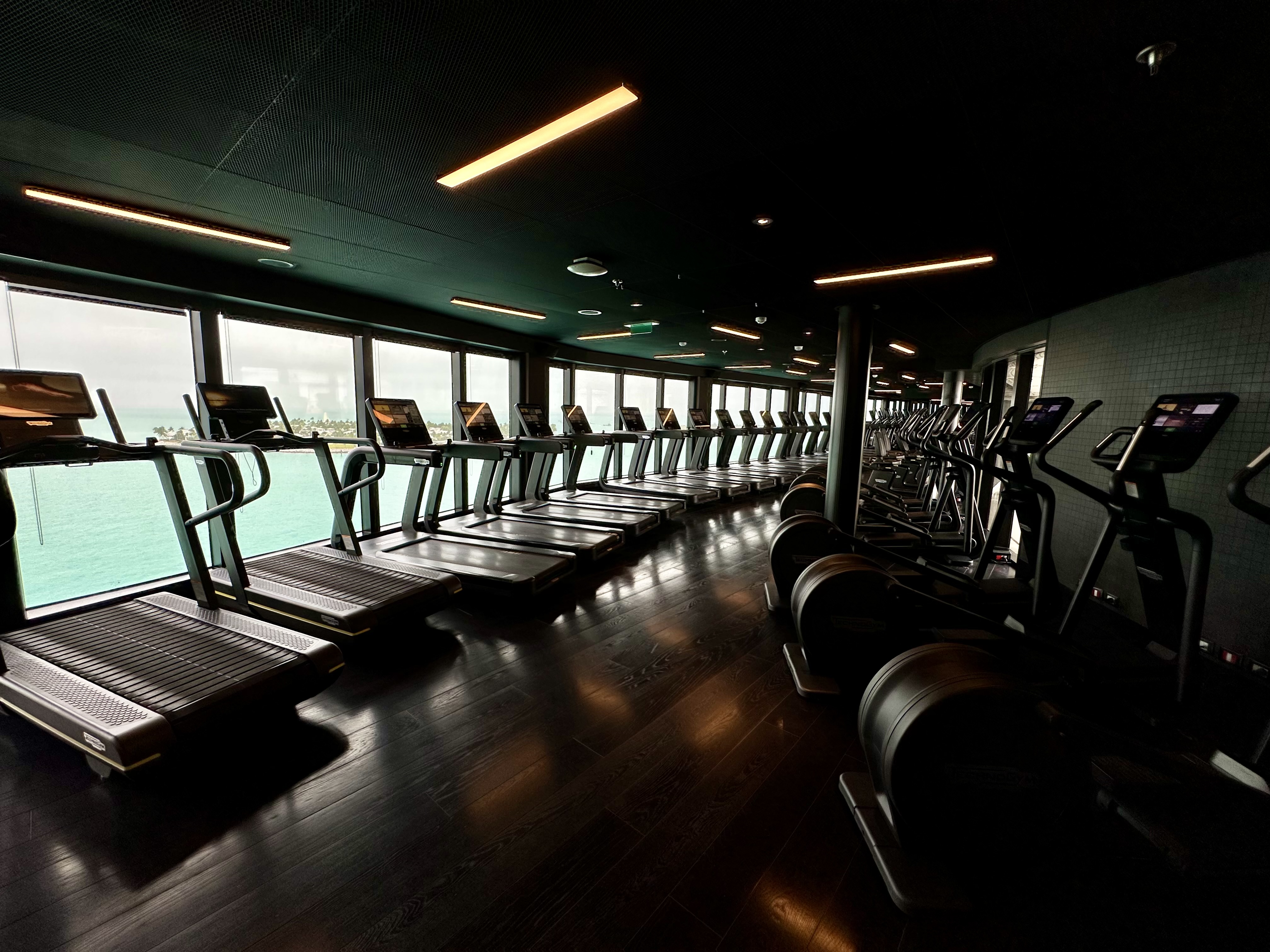 a room with treadmills and exercise equipment