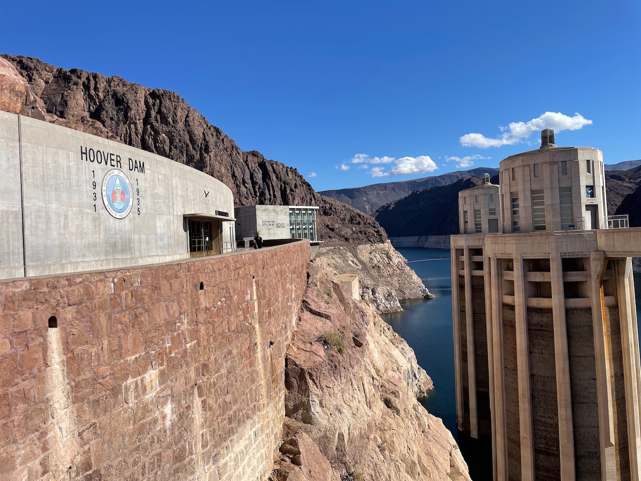 a building on a cliff by water