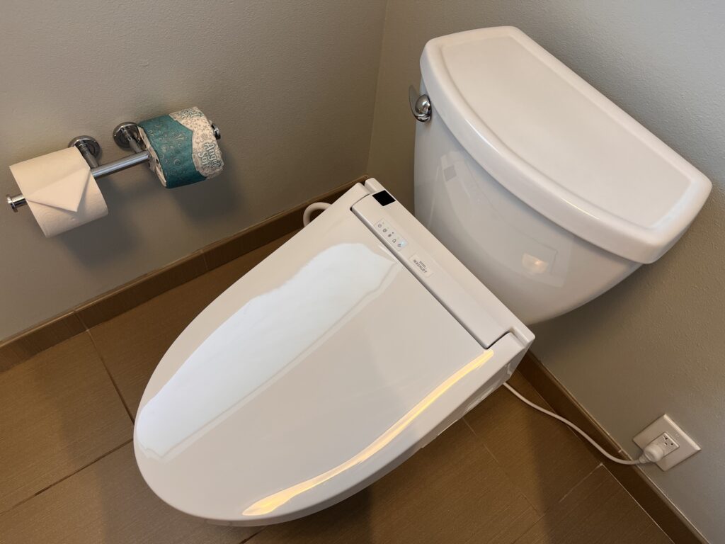 a toilet with a seat open