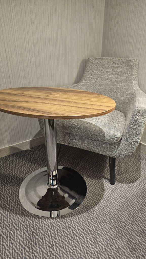 a table and chair in a room
