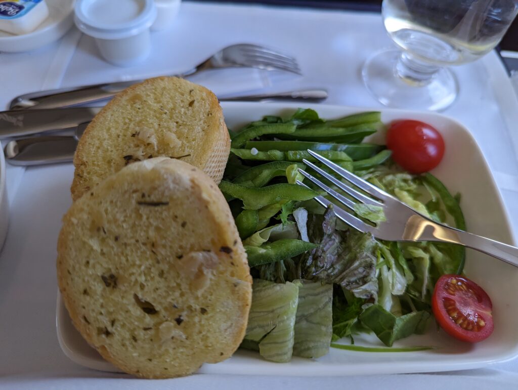a plate of food with fork and knife