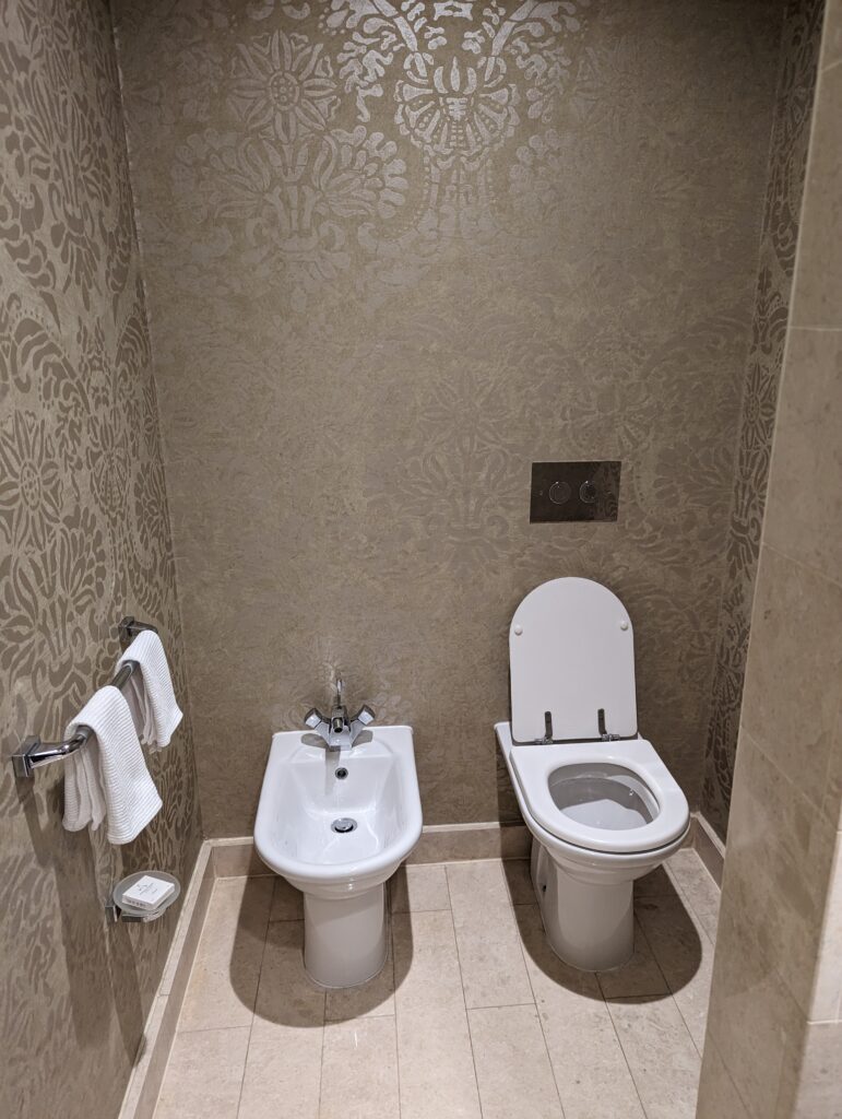 a toilet and bidet in a bathroom