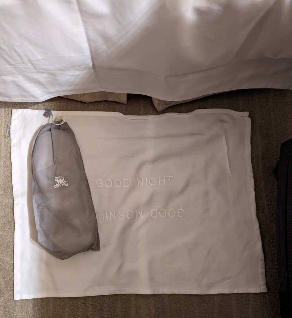 a white towel on a bed