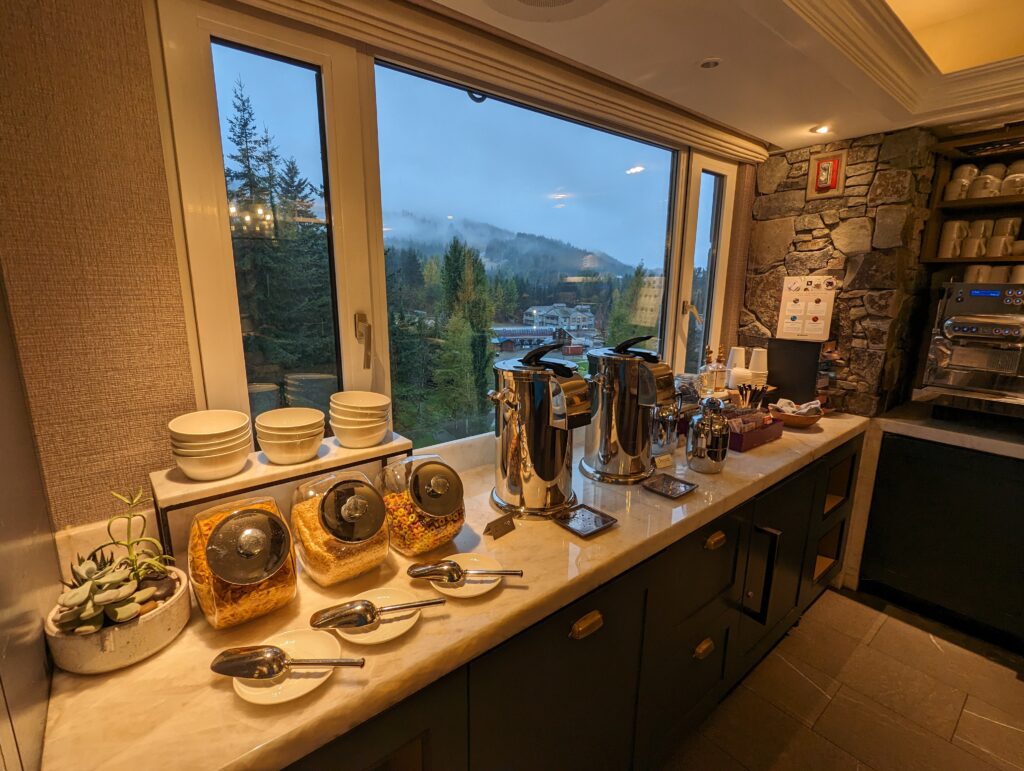 a counter with a window and a view of the mountains