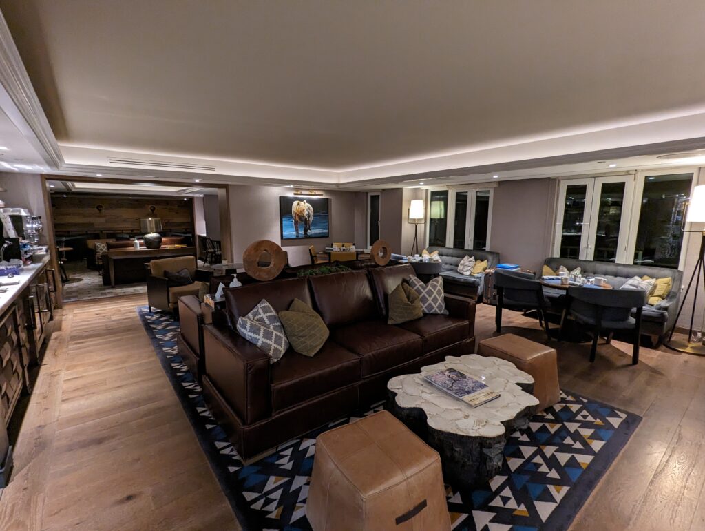 a room with a couch and tables