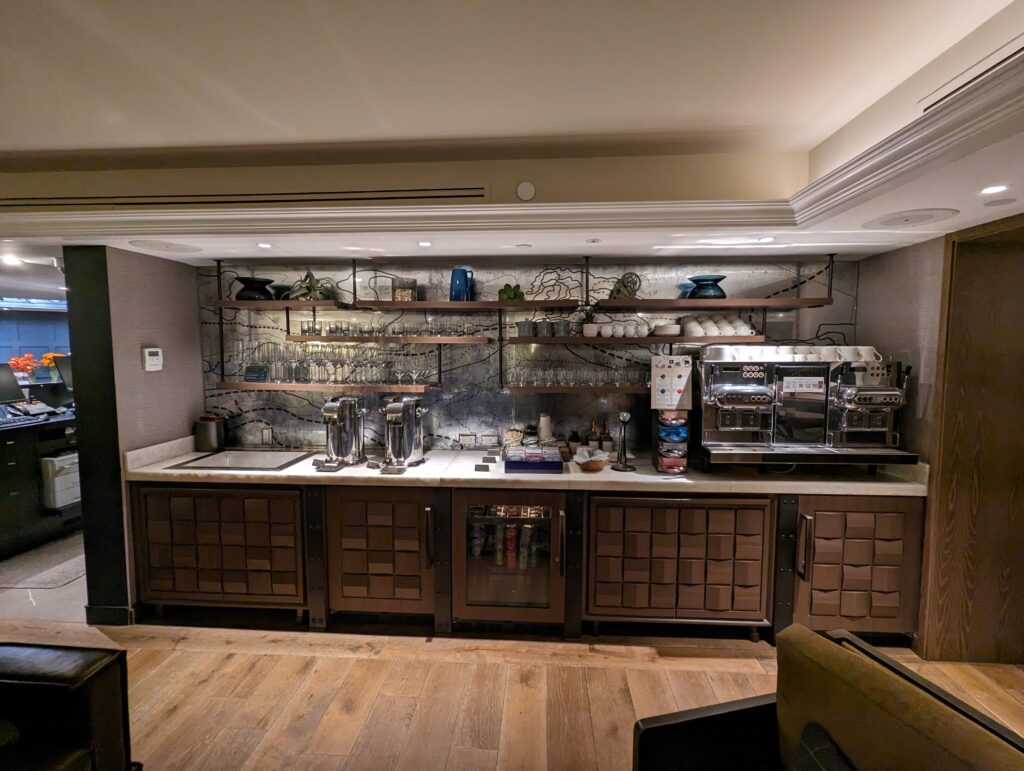 a kitchen with a counter top and shelves