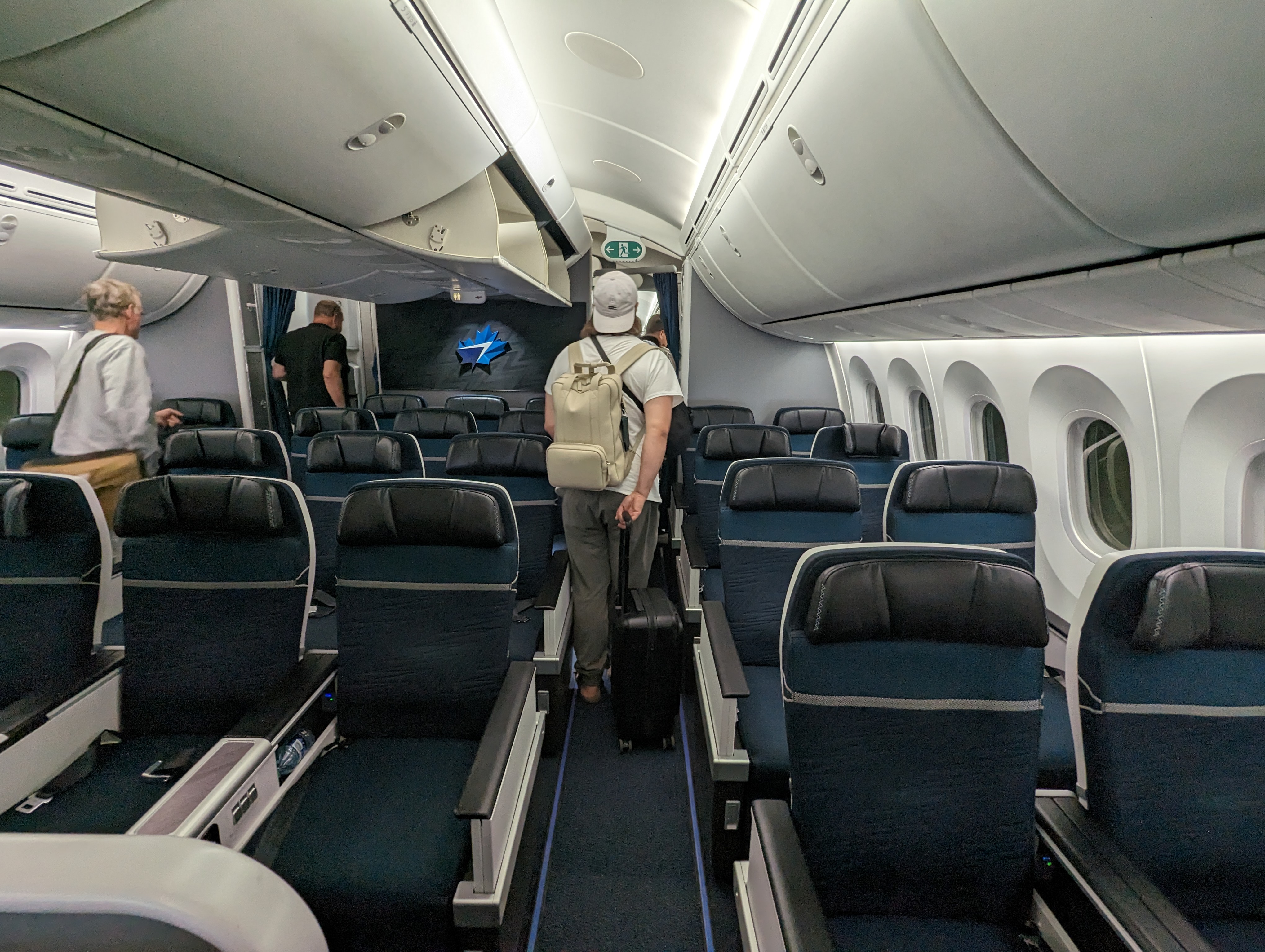 a person walking in an airplane