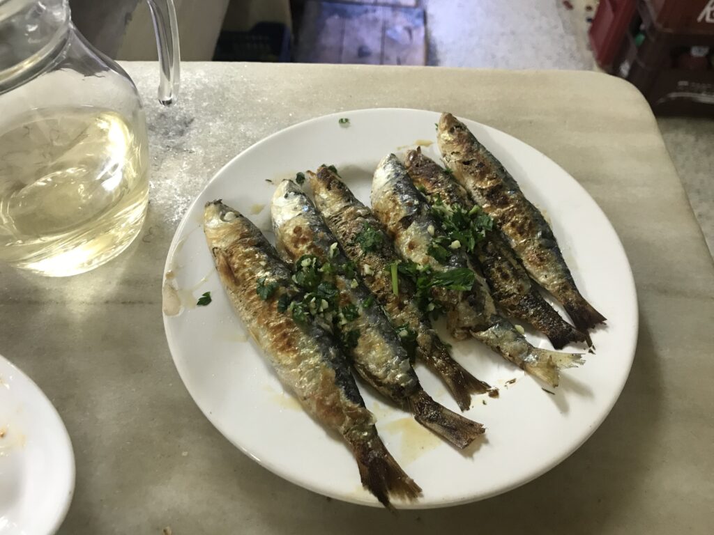 a plate of fried fish