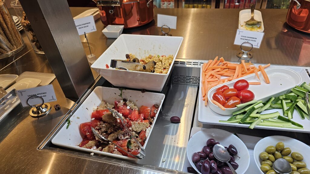 a buffet line with different types of food