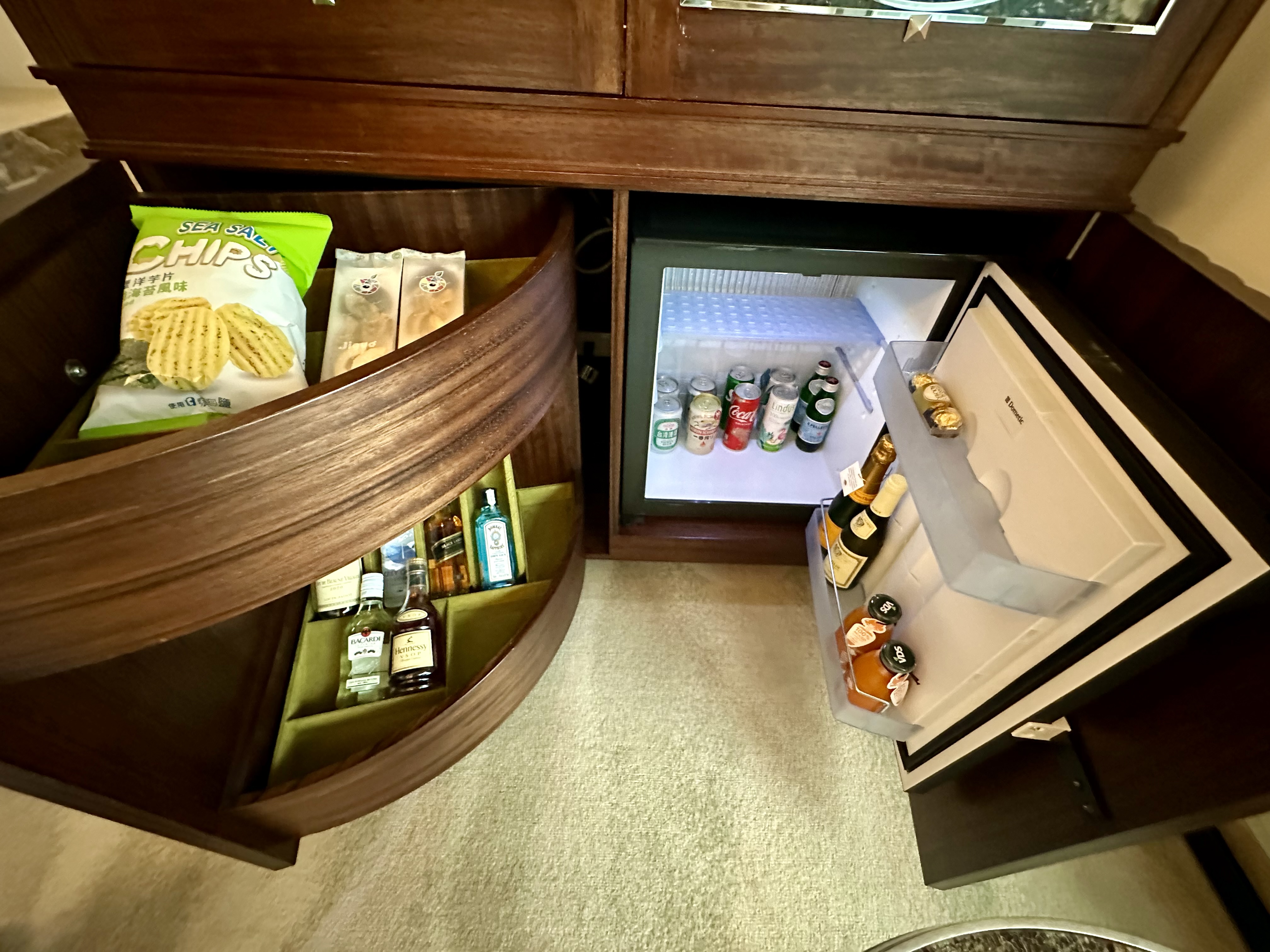 a small refrigerator with drinks inside