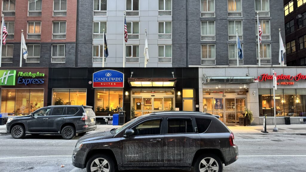 a car parked in front of a building