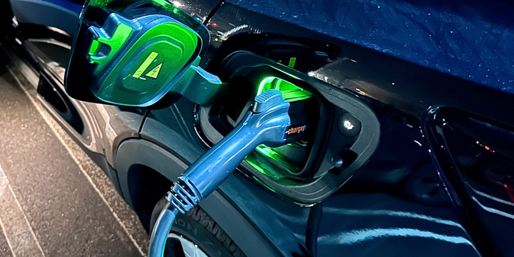 A charger connected to an electric car
