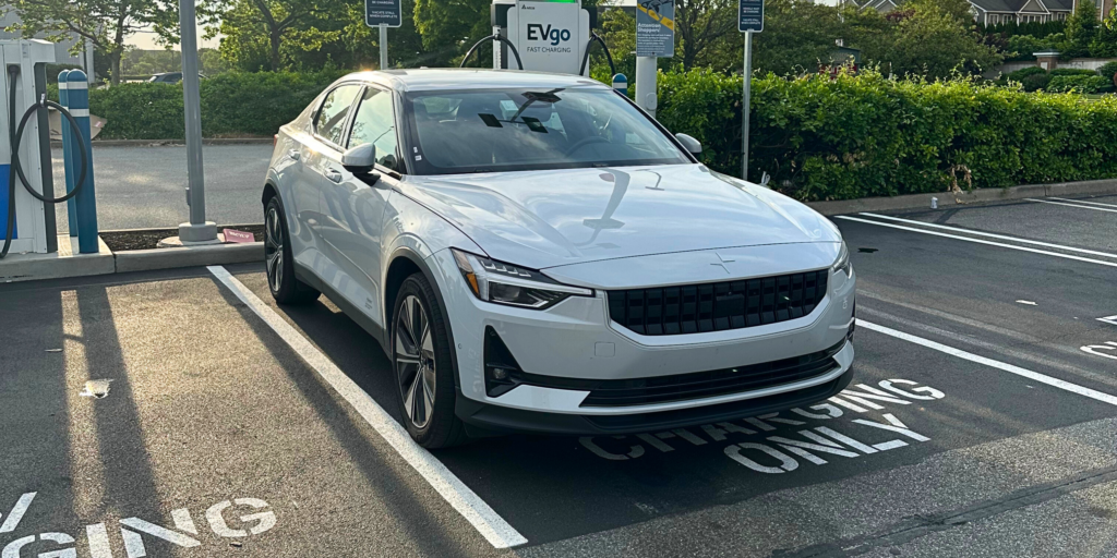 A Polestar 2 connected to charging station.