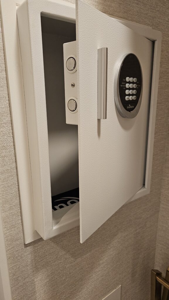 a white safe with a door open