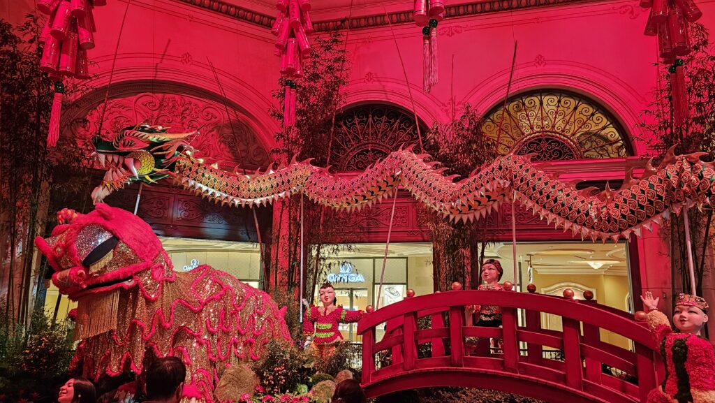 a red dragon statue in a building