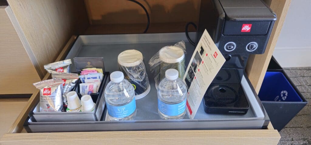 a tray with bottles and a card on it