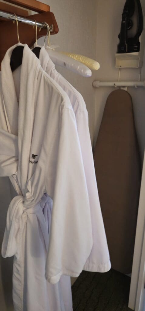 a white robe on a swinger