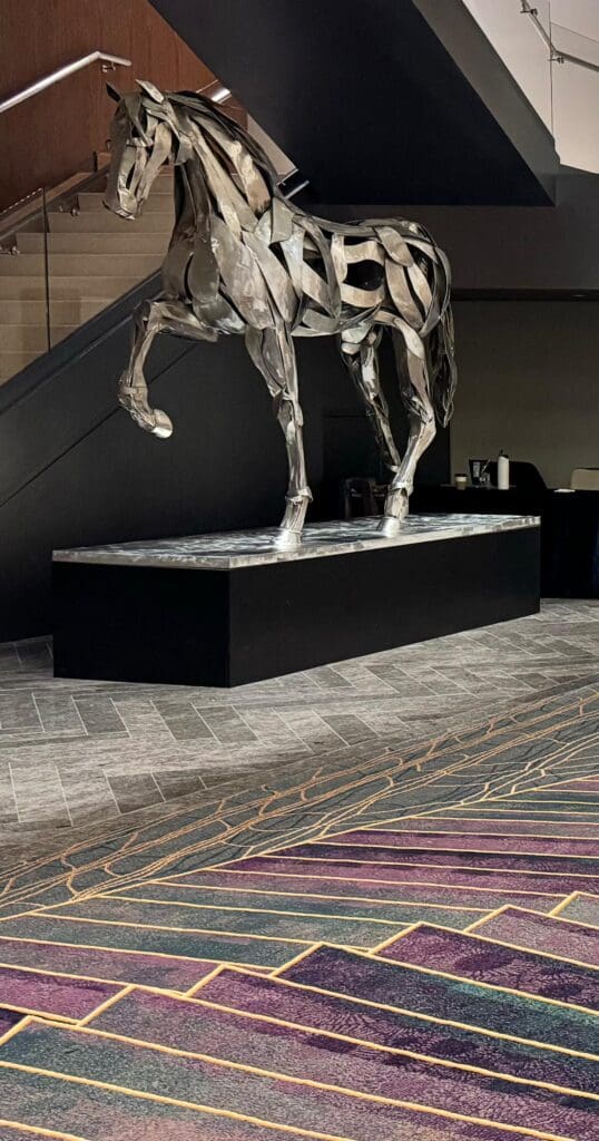 a statue of a horse on a pedestal