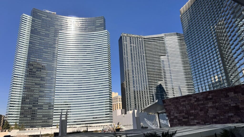 a group of tall buildings with Vdara in the background