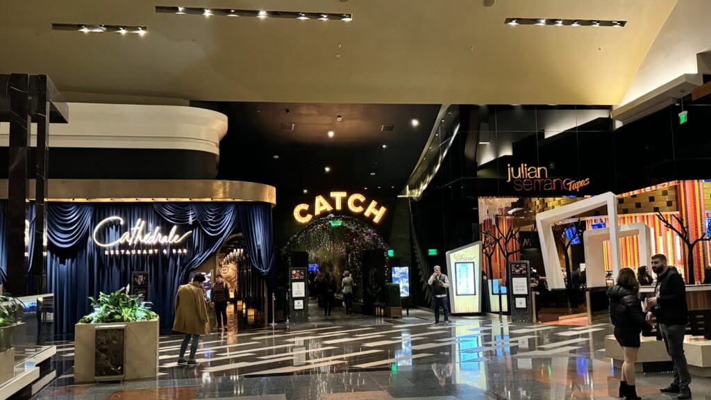 a group of people walking in a mall