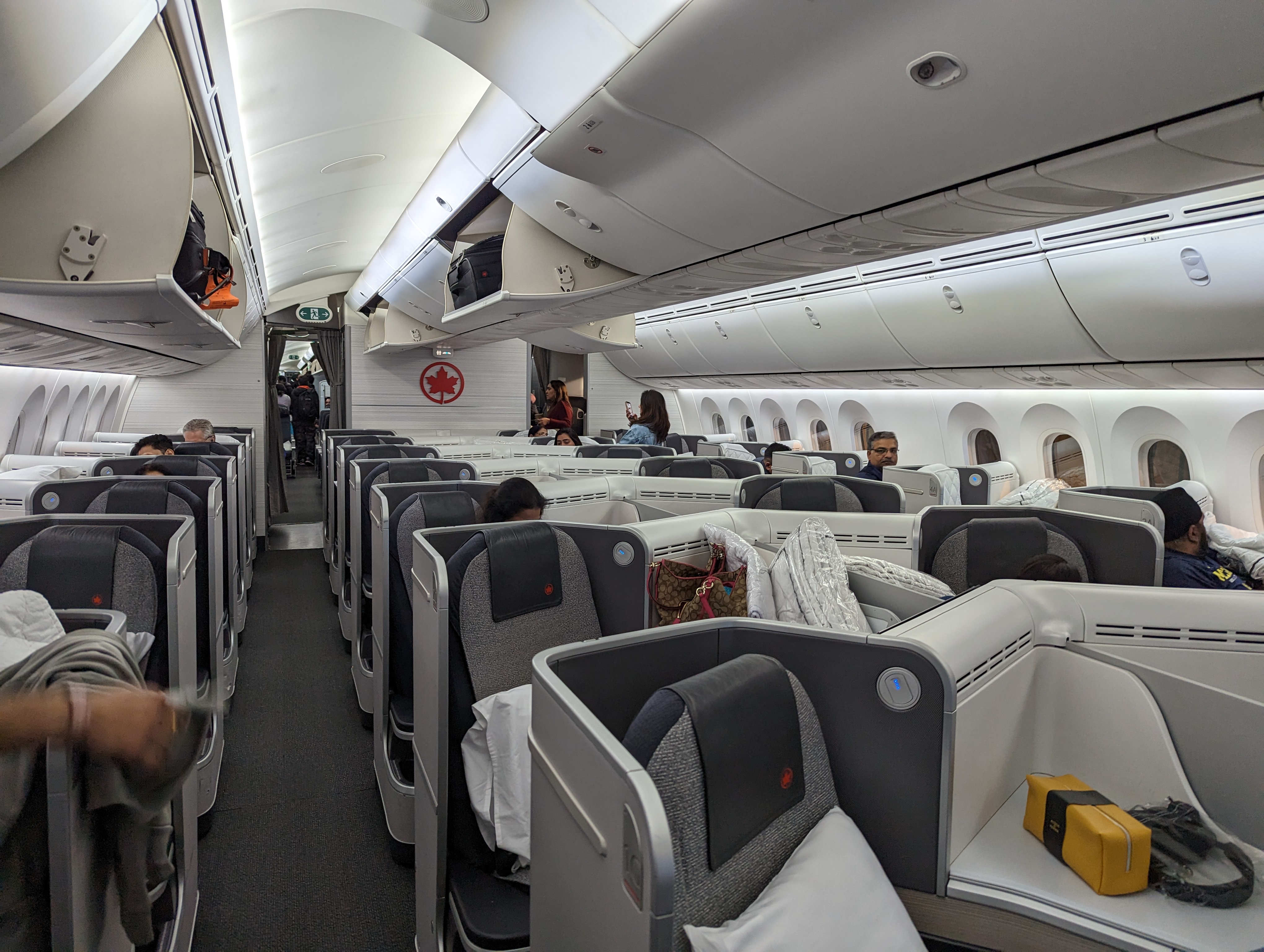 a plane with many seats and people