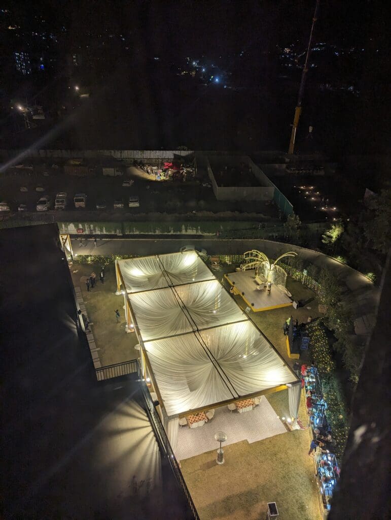 a rooftop of a building with lights