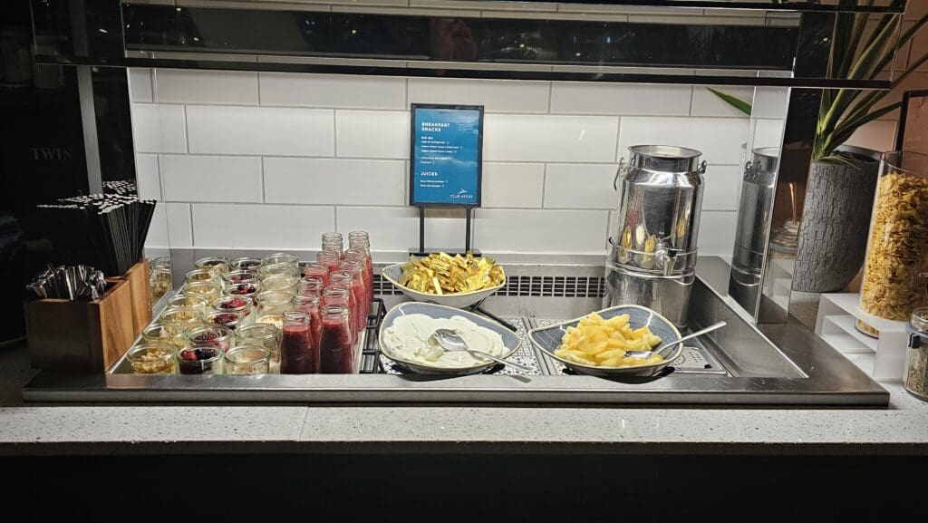 a buffet with food in a sink