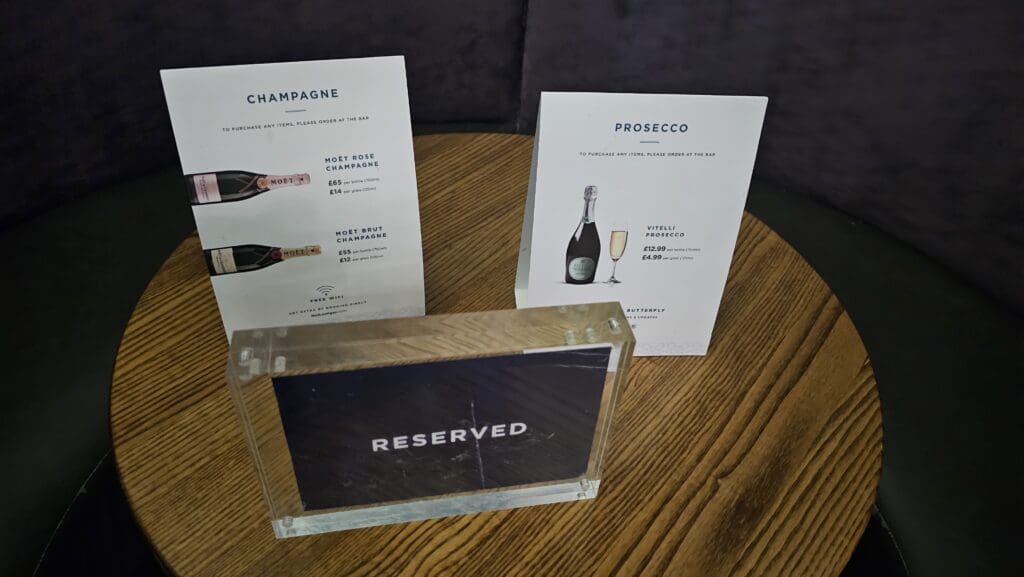 a table with a menu and a card