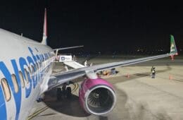 a plane on the runway at night