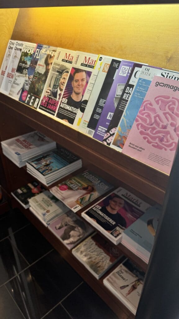 a shelf with magazines on it