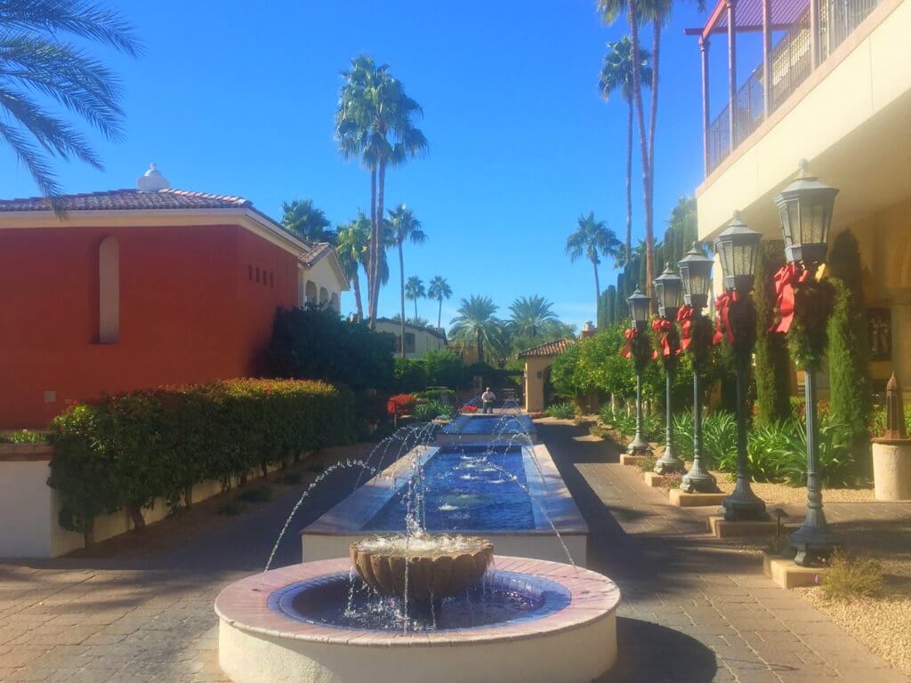 a water fountain in a courtyard