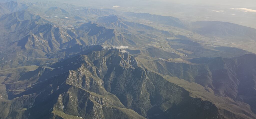 a aerial view of a mountain range