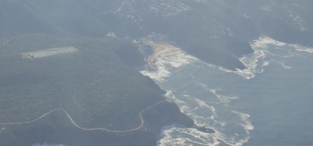 a road leading to a body of water