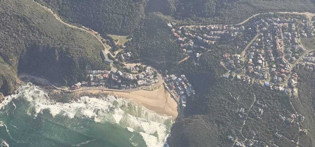 aerial view of a beach and town