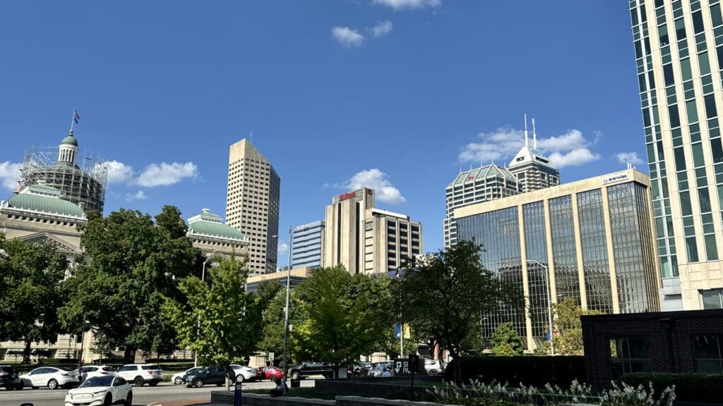 a city with tall buildings and trees