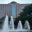 a water fountain in front of a building