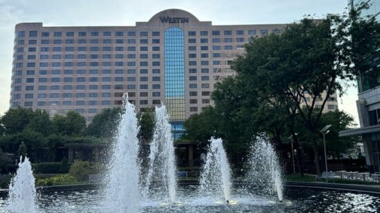 a water fountain in front of a building