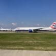 a group of airplanes on a runway