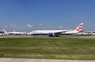 a group of airplanes on a runway